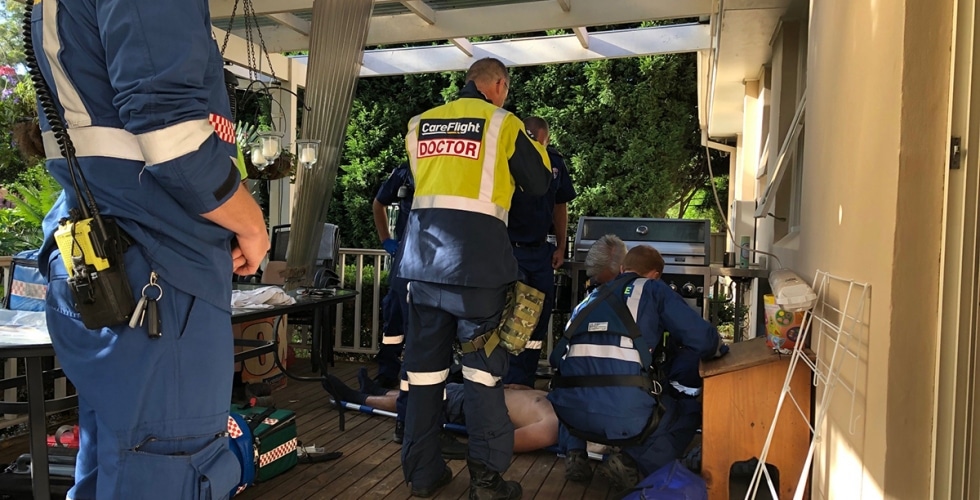 Man in stable condition after falling through roof - CareFlight