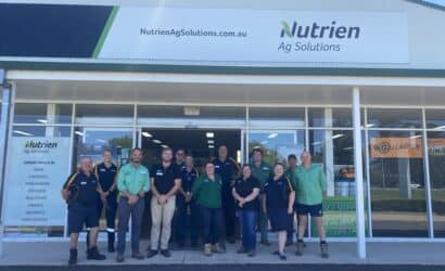 A group of people stand outside a Nutrien building, ready to undertake training.
